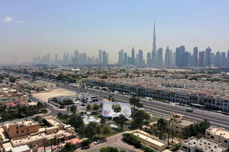 Al Wasl Nursery · UAE — aerial view of the nursery in its neighbourhood, city skyline behind