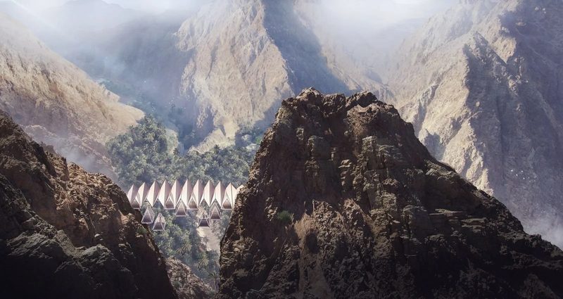The Floating Retreat · Sharjah mountains — a row of rooms hung across the cliff face between two peaks