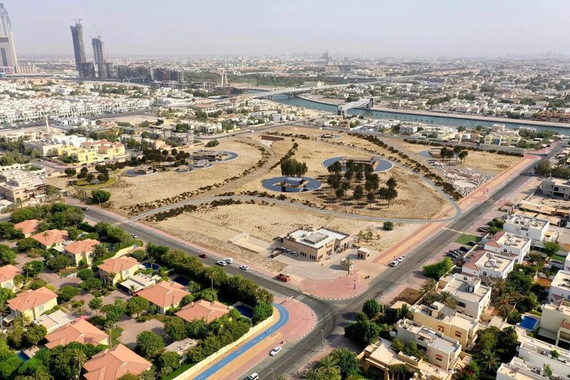Jumeirah Archaeological Square · Jumeirah — aerial view of the walled archaeological site among houses