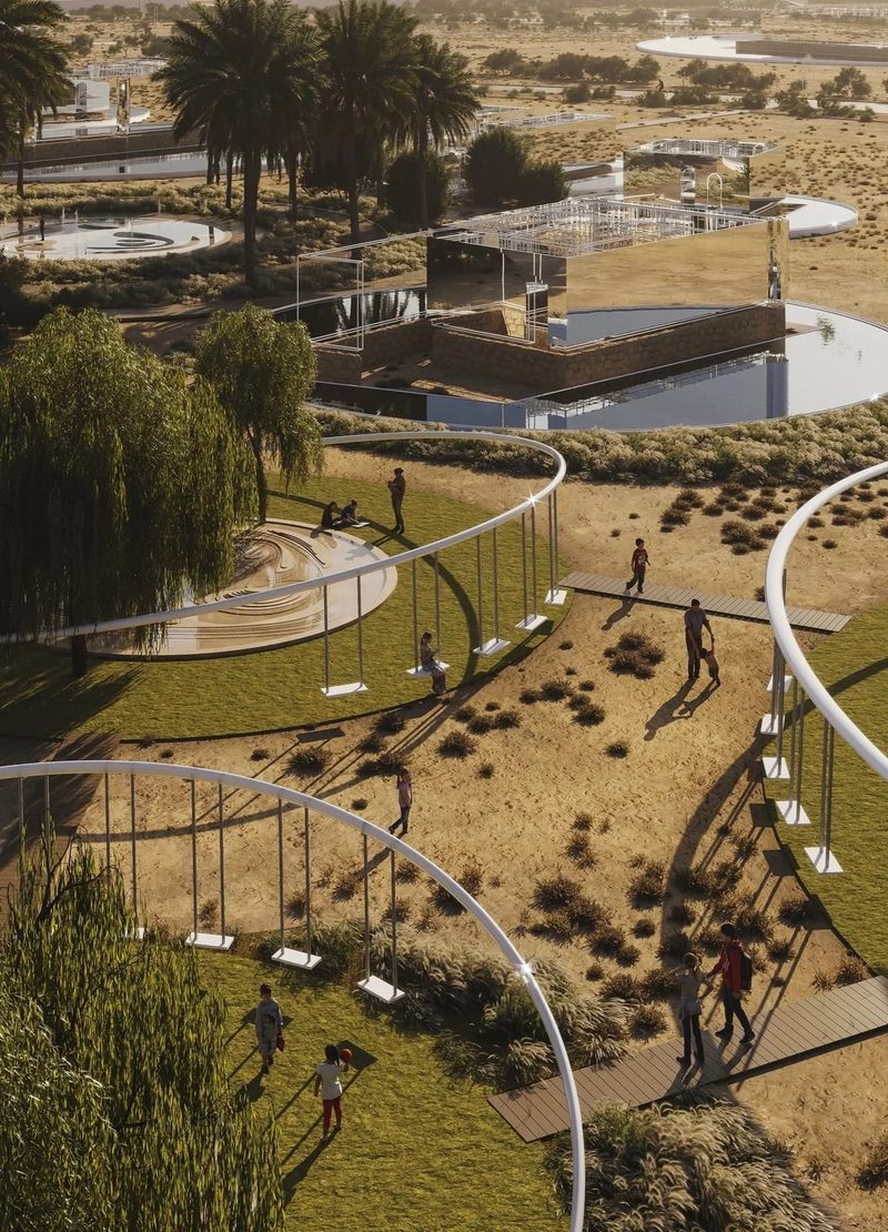 Jumeirah Archaeological Square · Jumeirah — paths, planting and pools across the square, aerial